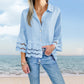 Solid Lapel Flared Sleeve Cutout Hem Blouse